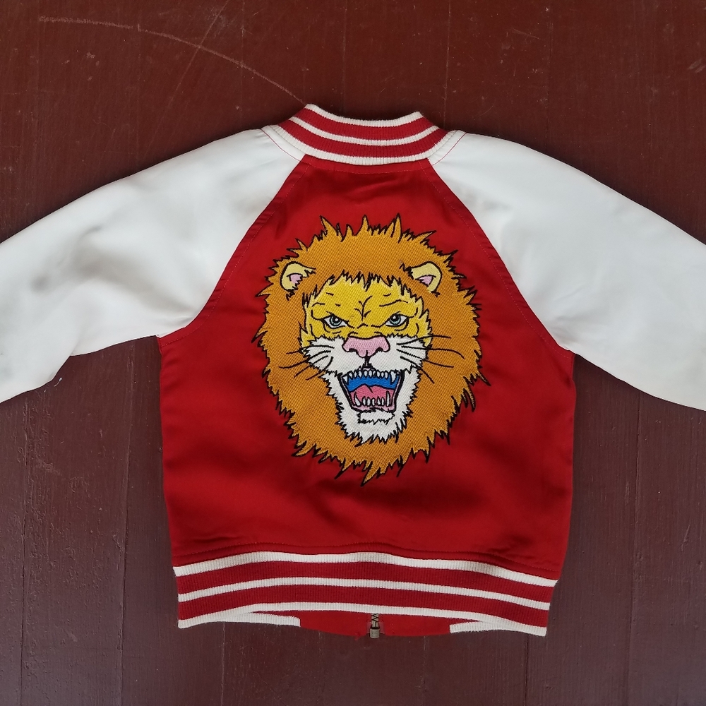 Genuine Kids by OshKosh Lion Bomber. 2T